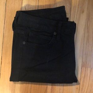 stretchy jeans, ripped at the knee and cutoffs